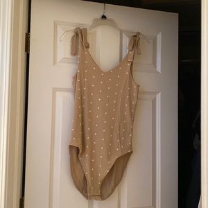 Medium brown polka dot body suit